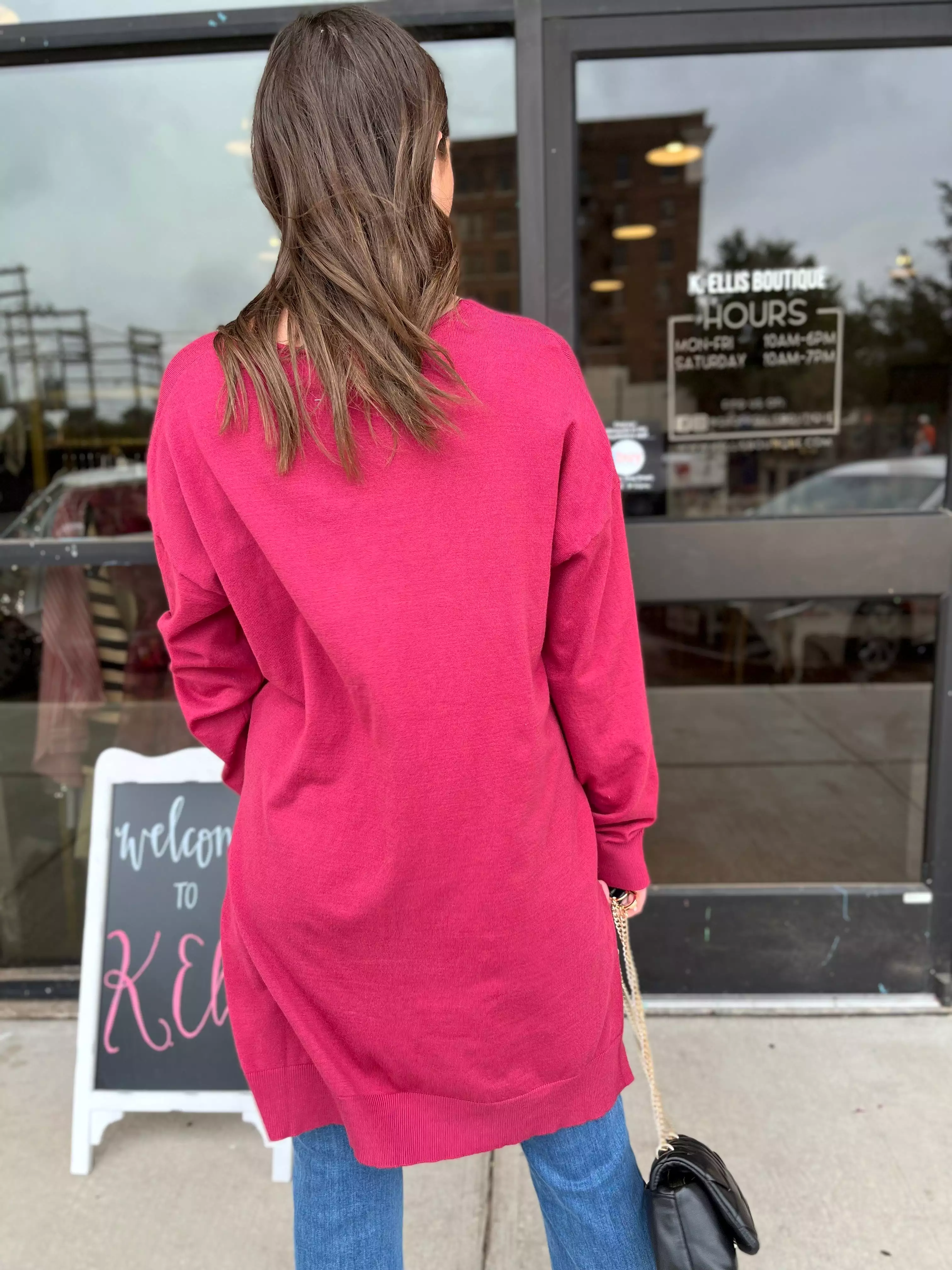 Deep V-neck Oversized Magenta Sweater.