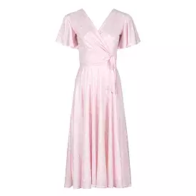 Pink polka dot swing dress with waterfall sleeves.