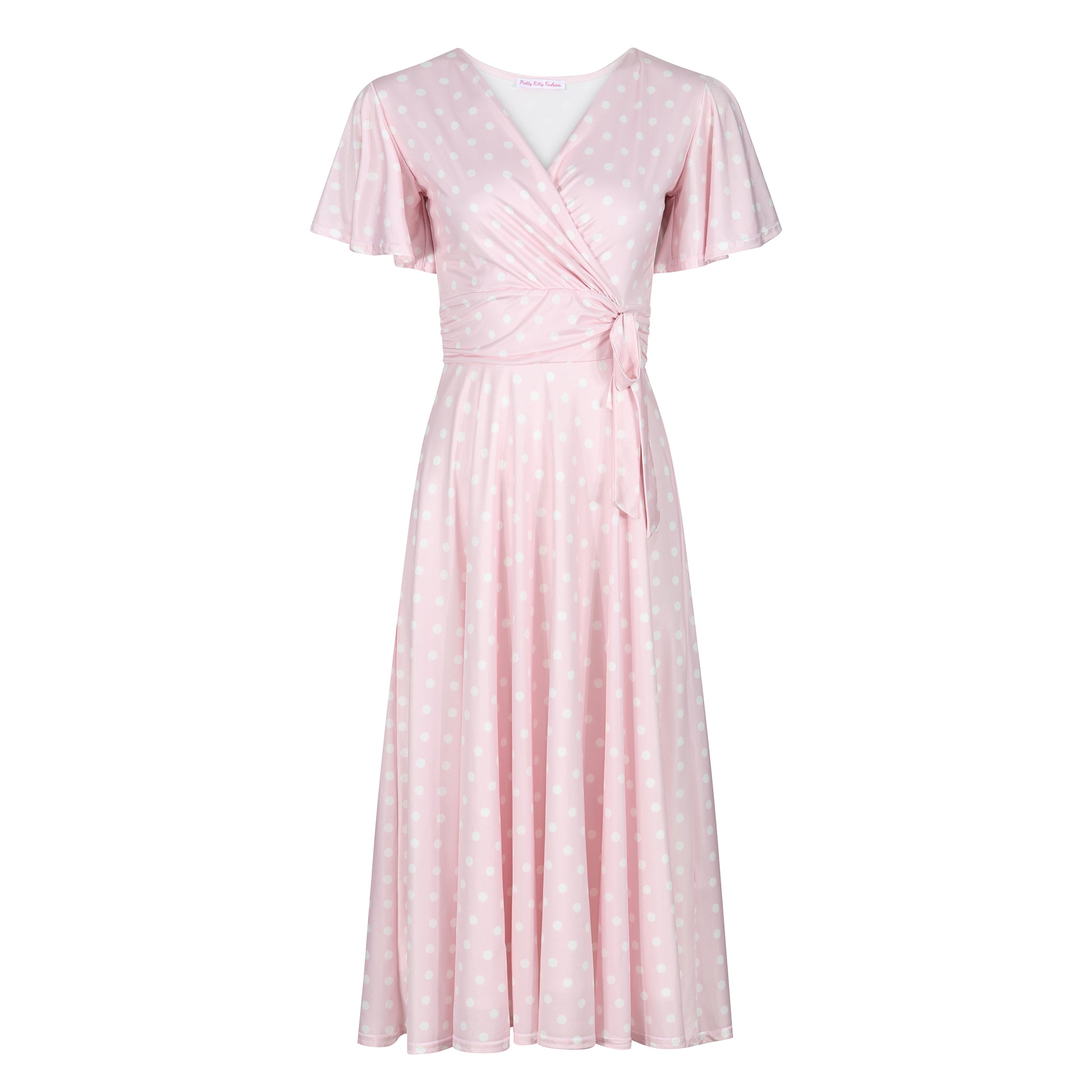 Pink polka dot swing dress with waterfall sleeves.